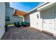 Paved patio area features comfortable seating, perfect for outdoor lounging and entertainment at 11328 Listening Dr, Orlando, FL 32832