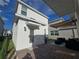 Charming backyard showcasing a brick patio and well-maintained lawn at 11328 Listening Dr, Orlando, FL 32832