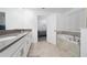 Bathroom featuring double sink vanity, tile flooring, and soaking tub at 11328 Listening Dr, Orlando, FL 32832