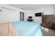 Bedroom featuring plush carpet, a bed, a television, and closet space for ample storage at 11328 Listening Dr, Orlando, FL 32832