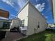 The exterior features a brick patio with outdoor lighting and manicured lawn under a blue sky at 11328 Listening Dr, Orlando, FL 32832