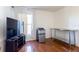 Relaxing Gathering room with hard wood floors, TV and Mini Fridge at 121 White Birch Dr, Kissimmee, FL 34743