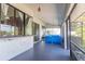 Spacious patio with screened windows and a pool at 121 White Birch Dr, Kissimmee, FL 34743