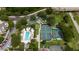Aerial view of the community's amenities: pool, pickleball and mini golf course at 1335 Greenfield Loop, Kissimmee, FL 34747