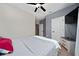 Spacious bedroom featuring modern gray wall paint and contrasting neutral paint at 1335 Greenfield Loop, Kissimmee, FL 34747