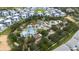 Awesome aerial view showcasing the community's amazing water park and tropical landscaping at 1335 Greenfield Loop, Kissimmee, FL 34747