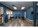 Well-equipped fitness center featuring machines and free weights in a spacious area at 1335 Greenfield Loop, Kissimmee, FL 34747