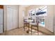 Breakfast nook with large windows and views of the pool and lanai at 13525 Mallard Cove Blvd, Orlando, FL 32837