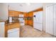 Kitchen featuring granite countertops, tile backsplash, stainless steel appliances and tile flooring at 13525 Mallard Cove Blvd, Orlando, FL 32837