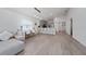 Bright living room seamlessly connected to the kitchen, providing a modern and open-concept living space at 1719 Daystar Dr, Haines City, FL 33844