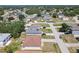 The property is nestled in a well-established neighborhood with mature trees and manicured lawns at 1912 Manatee Ln, Poinciana, FL 34759