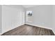 Cozy bedroom with window offering pleasant outdoor views and closet at 2 Dogwood Radl, Ocala, FL 34472