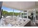 Luxurious hot tub with views of the lake and easy access to the sunroom and dining area at 201 Largo Dr, Kissimmee, FL 34759