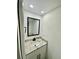 Modern half bath with stylish vanity and black fixtures at 2031 Balboa Way, Kissimmee, FL 34741