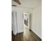 Bedroom featuring hardwood floors and bi-fold closet doors at 2031 Balboa Way, Kissimmee, FL 34741