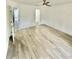A bedroom is bright and spacious, featuring an inviting balcony and two interior doorways at 2031 Balboa Way, Kissimmee, FL 34741