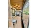 Relax on the screened porch with a ceiling fan and views of the backyard at 2031 Balboa Way, Kissimmee, FL 34741