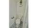 Half bath featuring a modern toilet and decorative tile flooring at 2031 Balboa Way, Kissimmee, FL 34741