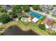 Community amenities including a pool, tennis court, lake, playground, and covered pavilion at 2146 Fish Eagle St, Clermont, FL 34714