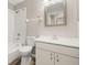 Bright bathroom with white vanity, framed mirror, and shower-tub combination at 2146 Fish Eagle St, Clermont, FL 34714