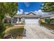 Charming single-story home with a well-maintained lawn and attached two-car garage at 2146 Fish Eagle St, Clermont, FL 34714
