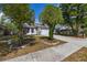 Well-maintained single-story home with manicured landscaping and green lawn at 2146 Fish Eagle St, Clermont, FL 34714