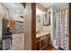 Bathroom featuring a sink and vanity with a tub and shower with a blue patterned shower curtain at 2225 Maryday Ct, Orlando, FL 32812
