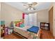 Bedroom featuring wood floors and a decorative divider at 2225 Maryday Ct, Orlando, FL 32812