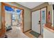 Inviting entryway leading to a bright living room with a sky-themed ceiling at 2225 Maryday Ct, Orlando, FL 32812