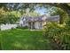 Charming single-story home featuring a well-manicured lawn and tasteful landscaping at 2225 Maryday Ct, Orlando, FL 32812