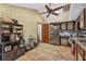 A cozy kitchen boasting stainless steel appliances, wood cabinets, and tiled flooring at 2225 Maryday Ct, Orlando, FL 32812