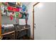 Laundry room includes a Samsung washing machine, dryer, and storage shelves above at 2225 Maryday Ct, Orlando, FL 32812