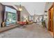 The living room is full of natural light and a vaulted ceiling, creating an open living space at 2225 Maryday Ct, Orlando, FL 32812