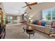 Spacious living room features neutral walls, modern furnishings, and plenty of natural light at 2225 Maryday Ct, Orlando, FL 32812