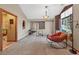 This spacious living area is characterized by a comfortable seat and neutral decor, creating an inviting ambiance at 2225 Maryday Ct, Orlando, FL 32812