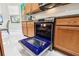Modern kitchen showcasing stainless steel oven and updated cabinetry at 271 Indian Wells Ave, Poinciana, FL 34759