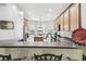 Bright kitchen featuring ample counter space, modern appliances, and a breakfast bar at 271 Indian Wells Ave, Poinciana, FL 34759