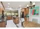 Well-appointed kitchen and breakfast nook with modern appliances and island at 271 Indian Wells Ave, Poinciana, FL 34759