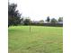 Large, well-maintained backyard features green grass and privacy fence at 2805 Rodeo Dr, Kissimmee, FL 34746