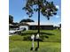 Charming single-story home with a well-manicured lawn, driveway, and inviting curb appeal at 2805 Rodeo Dr, Kissimmee, FL 34746