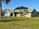 Charming single-story home featuring a stone accent wall and a well-maintained front yard at 2805 Rodeo Dr, Kissimmee, FL 34746