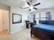 Bedroom with desk, ceiling fan, and a view of the outdoors at 2939 Sera Bella Way, Kissimmee, FL 34744