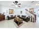 This comfortable living room features two sofas and a staircase at 2939 Sera Bella Way, Kissimmee, FL 34744