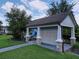 Exterior of a community mail kiosk featuring stone columns, a covered area, and mailboxes at 2939 Sera Bella Way, Kissimmee, FL 34744