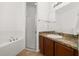 Bright bathroom featuring a soaking tub, vanity and shower at 326 Highland Meadows Ave, Davenport, FL 33837