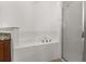 Bathroom featuring a soaking tub and shower at 326 Highland Meadows Ave, Davenport, FL 33837