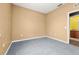 Empty bedroom with carpet, a window, and plain walls at 326 Highland Meadows Ave, Davenport, FL 33837