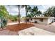 Spacious backyard with covered patio and mature trees and landscaping at 3621 Devonswood Dr, Orlando, FL 32806