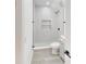 Modern bathroom features a glass shower with tiled walls and flooring, creating a luxurious feel at 3621 Devonswood Dr, Orlando, FL 32806