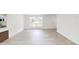 Open-concept living room with an abundance of natural light and seamless flow at 3621 Devonswood Dr, Orlando, FL 32806